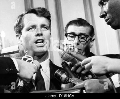 Senator Robert Kennedy in a press conference. He responded to an announcement that 12,000 workers would be affected by the Stock Photo