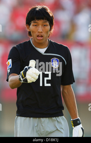 SUEZ, EGYPT - SEPTEMBER 29:  South Korea goalkeeper Seung Gyu Kim in action during the 2009 FIFA U-20 World Cup Group C match against Germany at Mubarak Stadium on September 29, 2009 in Suez, Egypt. Editorial use only. Commercial use prohibited.  (Photograph by Jonathan Paul Larsen / Diadem Images) Stock Photo