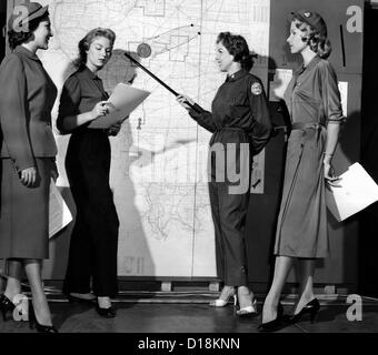 Models exhibit the new blue uniforms for women volunteers in Federal Civil Defense Agency (FCDA). Millions of women Stock Photo