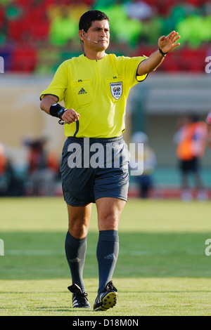 SUEZ, EGYPT - SEPTEMBER 29:  Referee Oscar Ruiz (COL) officiates the 2009 FIFA U-20 World Cup Group C match between South Korea and Germany at Mubarak Stadium on September 29, 2009 in Suez, Egypt. Editorial use only. Commercial use prohibited.  (Photograph by Jonathan Paul Larsen / Diadem Images) Stock Photo