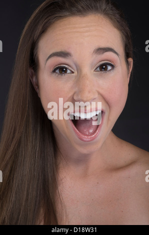 Happy / ecstatic woman with huge smile Stock Photo