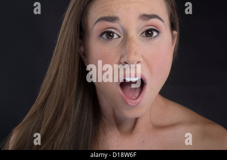 Shocked / amazed / astounded woman Stock Photo