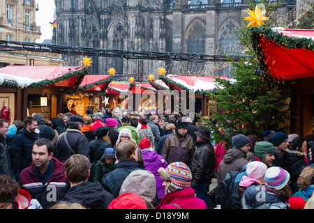 Many visitors to Christmas market in Cologne Germany Stock Photo