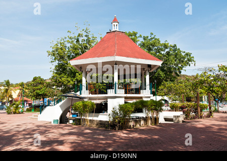 concrete bandstand in small town of Santa Cruz with cafe kitchen underneath serving food on the brick plaza Huatulco Mexico Stock Photo
