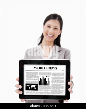 Businesswoman showing her digital tablet Stock Photo
