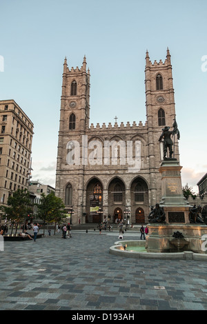 The Notre Dame Basilica viewed from Place d'armes Montreal Quebec Stock Photo