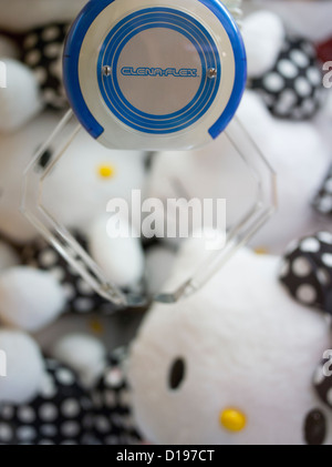 Hello Kitty  / Kitty-chan stuffed toys in a UFO catcher machine in Shinjuku Tokyo Stock Photo