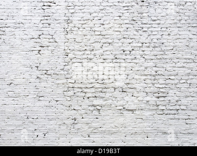Cracked white brick wall background Stock Photo
