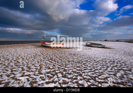 Crab boats on Cley Beach in Winter north Norfolk coast UK Stock Photo