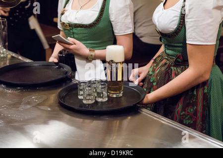 Waitresses in Löwenbräu Pub in Munich Stock Photo