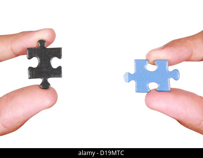 Hands and puzzle, isolated on white background Stock Photo