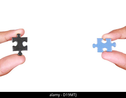 Hands and puzzle, isolated on white background Stock Photo