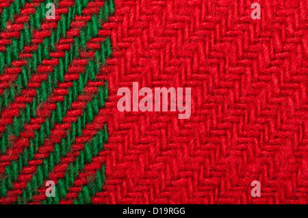 Handmade knit green and red background. Close up structure of the yarn. Christmas colors Stock Photo