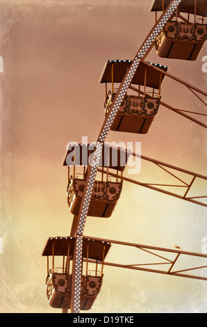 Detail of the cabin of The famous giant christmas's wheel, operating from december till the end of carnival period in place masssena  in Nice, Cote Azur, France. retro and surrealistic  post processing used to increase the mood of the composition Stock Photo