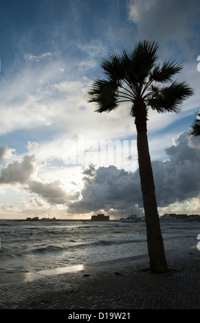 Storm clouds gather over the waterfront at Paphos Cyprus Stock Photo