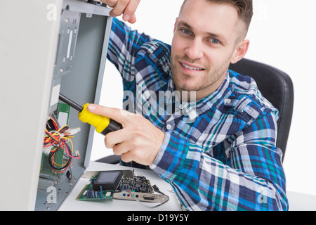 Computer engineer repairing cpu at workplace Stock Photo
