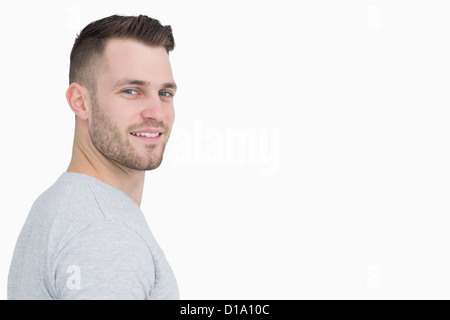 Side view of smiling young man Stock Photo