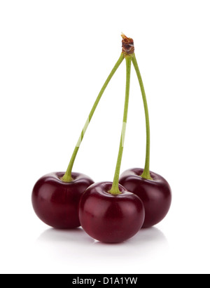 Three ripe cherries. Isolated on white background Stock Photo