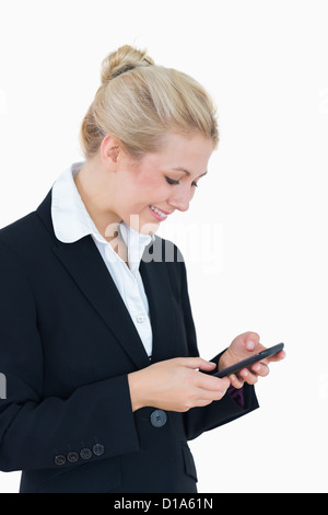 Young business woman using smartphone Stock Photo