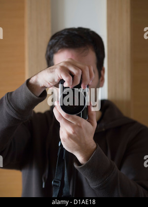 Man taking photos Stock Photo