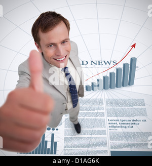 Close up of smiling businessman giving thumb up Stock Photo