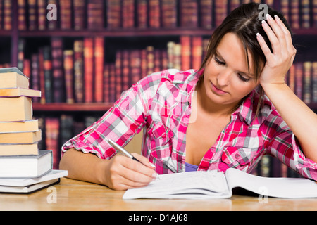 Student working in library Stock Photo