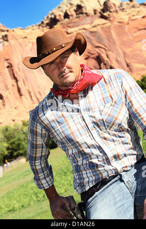 SOUTH WEST - A cowboy takes time to rest and reflect. Stock Photo