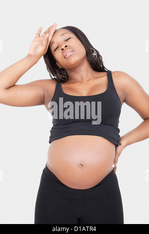 Tired young pregnant woman over Stock Photo