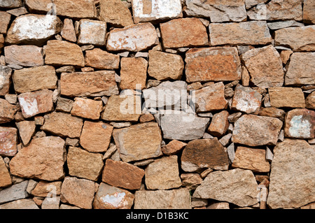 Stone wall made from large rocks Stock Photo