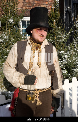 man in period dress playing the part of a drunk at the victorian festival of christmas portsmouth Stock Photo