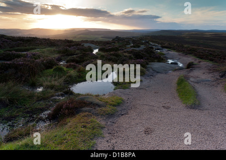 Sunset from Stanage Edge in the Peak District on a late summer's evening. Stock Photo
