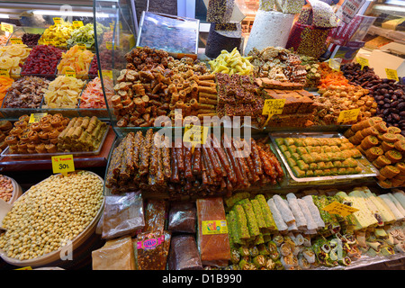 Turkish Delight and Viagra herbs with dried fruit nuts and Baklava on display in Spice Market Istanbul Turkey Stock Photo