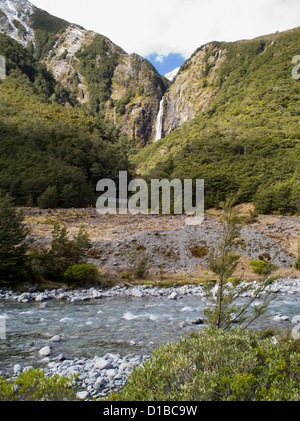 New Zealand's Devil's Punchbowl waterfall on a sunny day, looking across the Bealey River; Arthur's Pass National Park Stock Photo