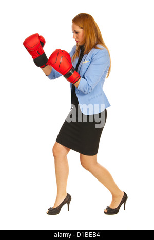 Full length of business woman boxing isolated on white background Stock Photo