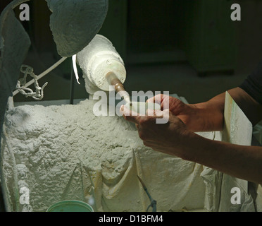 processing of jade in the studio to put up for sale in China Stock Photo