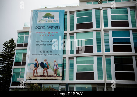 Modern old peoples home using image of aged surfers in Bondi, surfers paradise. Stock Photo