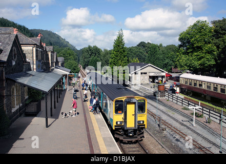 Passengers getting off a Llandudno to Blaenau Ffestiniog train at Betws-y-Coed, Gwynedd. Stock Photo