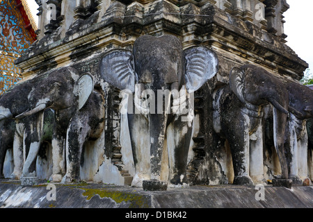 The Chedi decorated with elephants in Wat Chiang Man, the oldest temple in Chiang Mai, Thailand Stock Photo