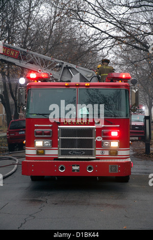 Ladder Company 22 at scene of house fire Detroit Fire Department Detroit Michigan USA Stock Photo