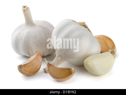 Garlic cloves and bulbs isolated on white Stock Photo