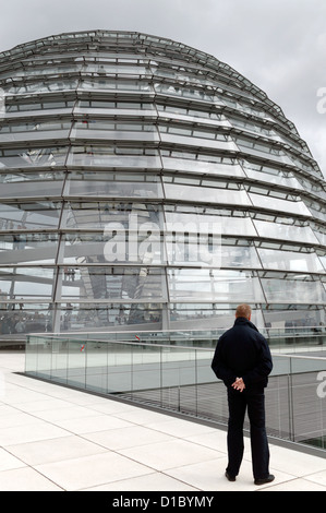 Berlin, Germany, security guard stands in front of the Reichstag dome Stock Photo