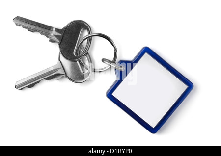 Two silver keys with blank key fob isolated on white Stock Photo