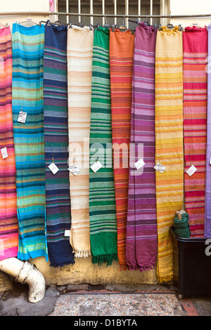 Rug stall in the Glass Arcade at St. Nicholas Market in Bristol Stock Photo