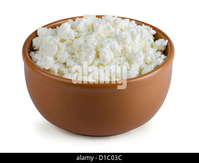 Brown clay bowl of cottage cheese isolated on white Stock Photo