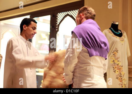 Dubai, United Arab Emirates, tourist haggling with a salesman Stock Photo