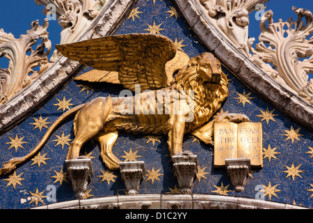 The winged golden lion of St Mark on the Basilica of San Marco, Venice Stock Photo