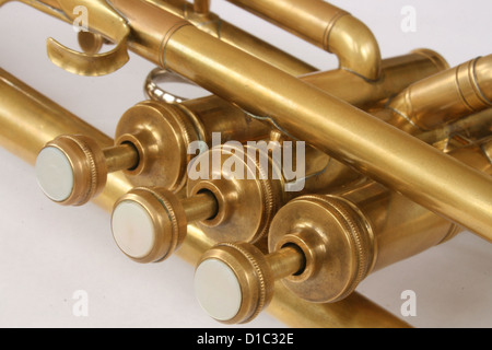 Tubes and valves on a vintage brass trumpet Stock Photo