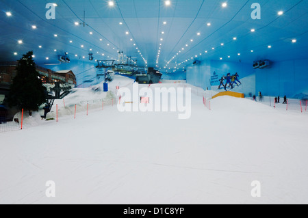 Ski Dubai is an indoor ski resort in the Middle East located in the second largest shopping mall in the world - Mall of Emirates Stock Photo
