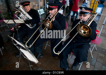 Lichfield, UK. 15th December 2012. Salvation Army Band playing Christmas Carols in Lichfield Market Place Staffordshire England Saturday 15th December 2012. Credit:  David Keith Jones / Alamy Live News Stock Photo