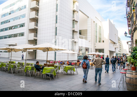 Sidewalk cafes are conveniently located outside the front entry of MACBA -- the museum of contemporary art in Barcelona, Spain.